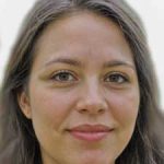 Shannon Bowen, editor - New Forest Books - a tanned, brown-eyed woman in her early 40s,, with brown hair and some grey mixed in, smiling